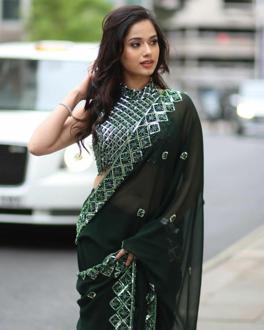 Model wearing a beautiful Soft Rangoli Silk Saree with sequence embroidery work, styled elegantly on the streets.